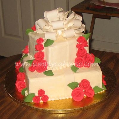 Buttercream Wedding Cake With Red Roses on Cake Central