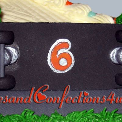 Close-Up Of Skateboard On Themed Sheet Cake Close-Up Of Skateboard On Themed Sheet Cake