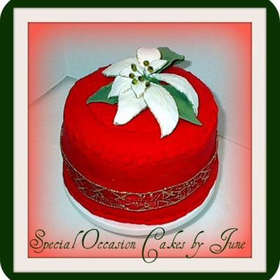 Red Christmas Cake With White Poinsettia Red Christmas Cake With White Poinsettia