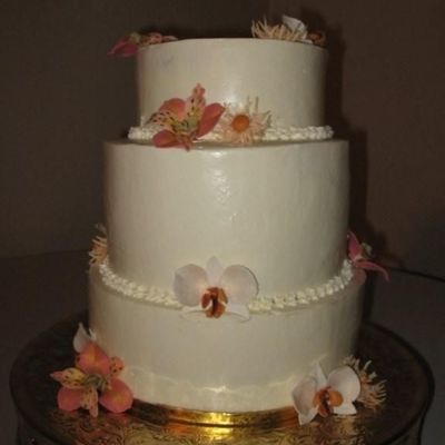 Buttercream Cake With Alstromerias, Mums, And Phaleonopsis Orchids on Cake Central