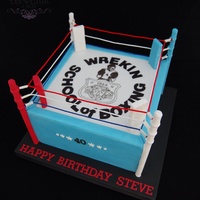 Boxing Ring Cake With a hand painted logo from the birthday boys former boxing club on top
