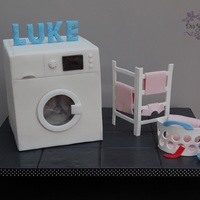 That Pesky Red Sock, It's Turned All My Washing Pink! I made this for my sons birthday as he's obsessed with washing machines. The clothes dryer and the basket are pastillage, everything...