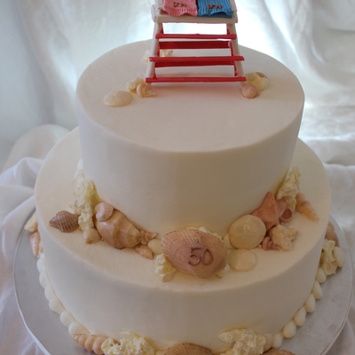 50 Anniversary Buttercream Icing And Chocolate Shells And Sea Coral Beach Stand Made Of Gumpaste Used Wire On The 4 Legs Of The Stand 50 Anniversary Buttercream Icing And Chocolate Shells And Sea Coral Beach Stand Made Of Gumpaste Used Wire On The 4 Legs Of The Stand