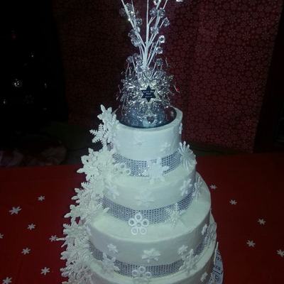 Four Tier Nine Layer White And Chocolate Cake Buttercream Filling With Buttercream Frosting Gumpaste Snowflakes Silver Cloth Mesh Rib