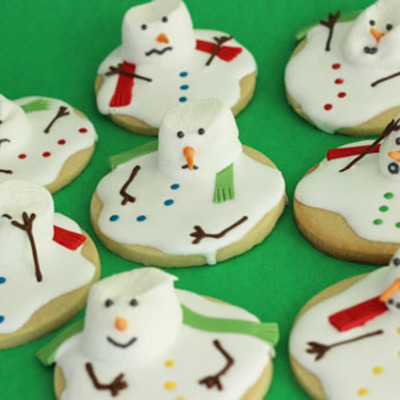 These Are Melted Snowman Cookies I Used Melted Chocolate For The Arms Fondant For The Scarves Modeling Chocolate For The Noses And Confet These Are Melted Snowman Cookies I Used Melted Chocolate For The Arms Fondant For The Scarves Modeling Chocolate For The Noses And Confet