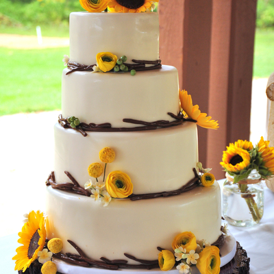 Modern Rustic Wedding Cake For An Outdoor Wedding 4 Offset Tiers With Fondant Twig Border And Handmade Sugar Flowers Consisting Of Sunflow...