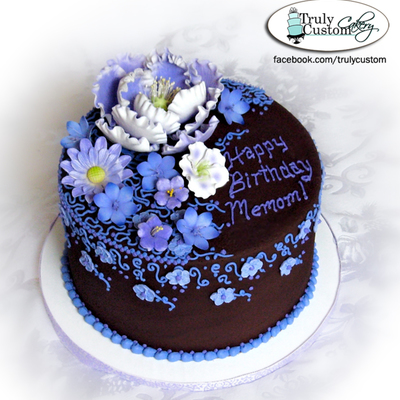 Chocolate Buttercream With Purple & Lavendar Flowers And Piping on Cake Central