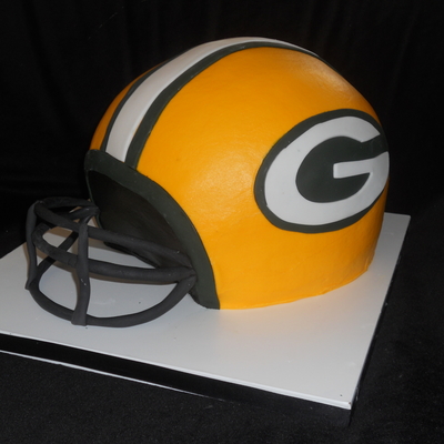 Go Pack Go Chocolate Cake With Chocolate Ganache Carved Into A Helmet With Gumpaste Face Mask Go Pack Go Chocolate Cake With Chocolate Ganache Carved Into A Helmet With Gumpaste Face Mask