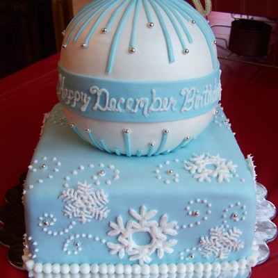 Snowflakeornament Birthday Cake For 4 Family Members Celebrating December Birthdays Cake Is Covered In Fondant And Decorated With Hand Pip... Snowflakeornament Birthday Cake For 4 Family Members Celebrating December Birthdays Cake Is Covered In Fondant And Decorated With Hand Pip...