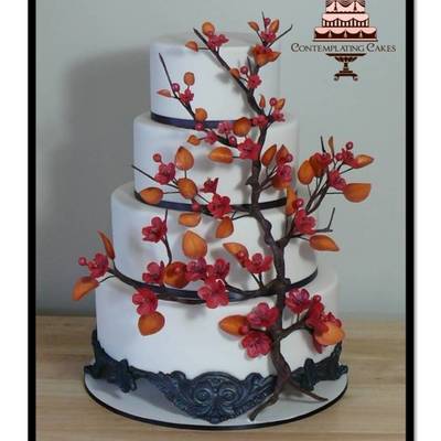 4 Tier Choc Mud 121086 Featuring Hand Crafted Gumpaste Cherry Blossoms And Leaves Actual Branch Is Sculpted Using Thick Gauge Flor 4 Tier Choc Mud 121086 Featuring Hand Crafted Gumpaste Cherry Blossoms And Leaves Actual Branch Is Sculpted Using Thick Gauge Flor