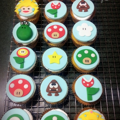 Super Mario Brothers Cake Is Dark Chocolate Fudge With Peanut Butter Filling And Buttercream Icing Cupcakes Are Fudge Marble With Butterc Super Mario Brothers Cake Is Dark Chocolate Fudge With Peanut Butter Filling And Buttercream Icing Cupcakes Are Fudge Marble With Butterc