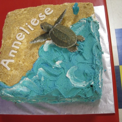 Buttercream Frosting Over Chocolate Cake Layered With Caramel Sand Is Crushed Graham Crackers Buttercream Frosting Over Chocolate Cake Layered With Caramel Sand Is Crushed Graham Crackers