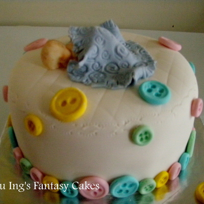 Rose Cake Flavor Inside With Layer Of Dark Chocolate And The Baby Topper From White Chocolate Rose Cake Flavor Inside With Layer Of Dark Chocolate And The Baby Topper From White Chocolate