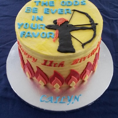 Hunger Games Theme Recipient Has Red Hair So Requested That Katniss Have Red Hair Too 4 Layer Rainbow Cake With Orange Cream Chees Hunger Games Theme Recipient Has Red Hair So Requested That Katniss Have Red Hair Too 4 Layer Rainbow Cake With Orange Cream Chees