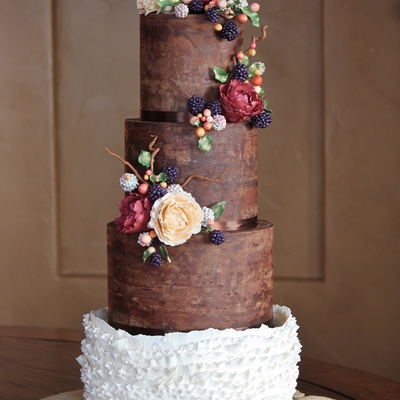 Rustic And Organic Wedding Cake With Chocolate Ganache Ruffles And Handmade Sugar Blackberries Hypericum Berries Peonies Leaves And Twi