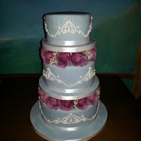 65Th Birthday A cake for my mother's 65th birthday.Three tiers with fresh flower blocking.Blue and white motif.