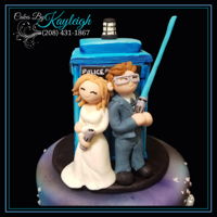 Wedding Topper Fondant Wedding topper made to resemble the bride and groom.