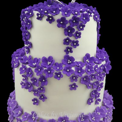 Cascading Purple Ombre Blossom Wedding Cake Cascading Purple Ombre Blossom Wedding Cake