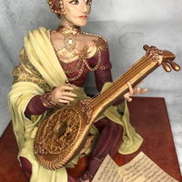 Lady Mandolin Sugar Sculpture for a cake competition November 2017 in Calgary Alberta She is created from an internal structure of copper tubing and...