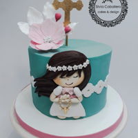 Communion Cake 2d little girl on a beautiful acquamarine colour and a gumpaste cosmos on top to celebrate this communion.