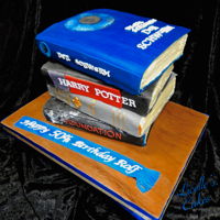 Stack Of Books Cake A stack of books cake. The pages are buttercream and covers fondant. Each book is an individual 2 layer cake - 2 chocolate and 2 vanilla on...