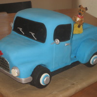 Pick Up Truck Okay for first try at truck. Just practicing. I just don't get opportunity to make cakes like I would like. Door has a dent from...