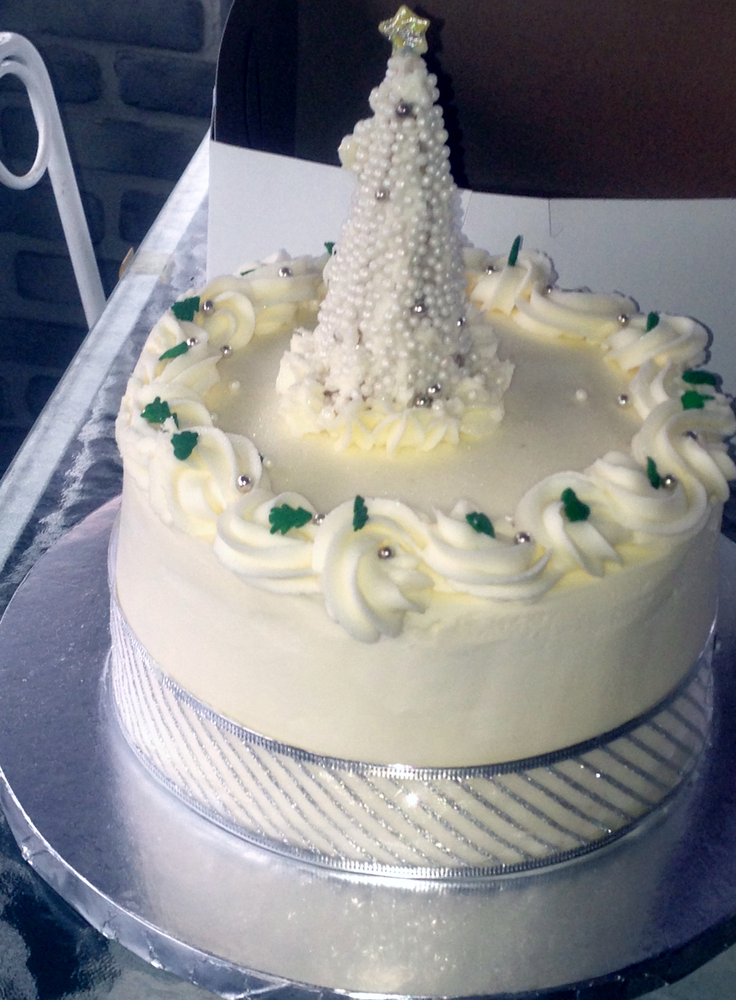 Almond Vanilla Cake Covered In Almond Buttercream And Topped With