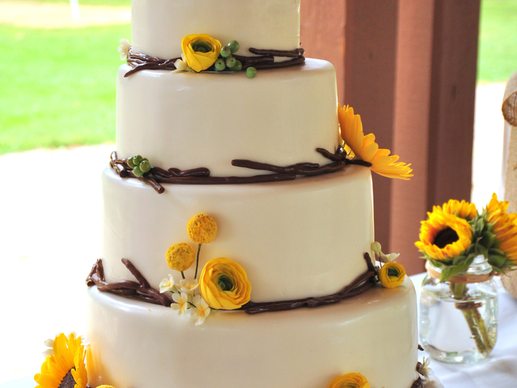Modern Rustic Wedding Cake For An Outdoor 4 Offset Tiers With Fondant Twig Border And Handmade Sugar Flowers Consisting Of Sunflow Modern Rustic Wedding Cake For An Outdoor 4 Offset Tiers With Fondant Twig Border And Handmade Sugar Flowers Consisting Of Sunflow