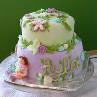 Fairy And Flowers fondant and buttercream flowers, fondant fairy with gelatin and wire wings.