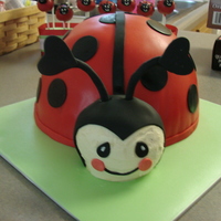 Lady Bug WASC cake with Vanilla Bean Cheese Cake Mousse. All fondant.