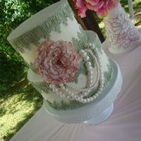 Lace And Pearls Strawberry Cake with Vanilla Bean Cheesecake Mousse and Cream Cheese Icing. Fondant/Gumpaste Pearls, flower and lace. TFL