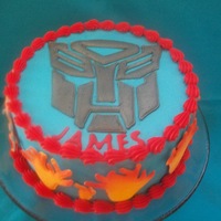 Transformers Buttercream with colorflow decorations that were airbrushed.