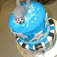 End Of The Year Soccer Party Cake Two tier cake with fondant accents and hand molded shark topper
