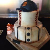 Baseball Themed Shower Cake Baseball themed cake for my daughter's baby shower. My first time covering a cake completely with fondant. It was so much fun. Fondant...