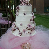 Dogwood Dream This is a 3 tier 6, 8, 10 on a pedistool. All the design is hand made with gumpaste.