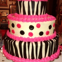 Sweet 16 Zebra Cake Buttercream icing and chocolate marshmallow black fondant stripes, fondant polkadots