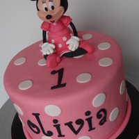 Minnie Mouse minnie mouse made with a combination of crispy rice treats, 50:50 mmf/candy clay, mmf w/tylose, and gumpaste