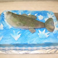 Lets Go Fishing fish is all fondant and the rest is bc icing and with some air brushing on the fish and cake