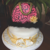 Rosie's Birthday Extravaganza This is a yellow cake filled with buttercream apricot filling. crumb coated with buttercream and decorated with fondant and edible paper...