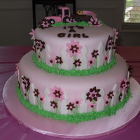 April's Baby Shower 12/8 stacked covered in fondant - shower theme pink john deere tractor. This cake took FOREVER to make, but turned out great