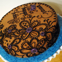 Mocha Buttercream Frosted Cake With Dark Chocloate Piping And Fondant Buttons Mocha buttercream frosted cake with dark chocloate piping and fondant buttons.