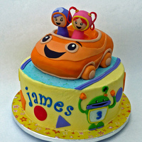 Team Umizoomi Umi car is sculpted cake MMF covered. The Geo and Millie figures are also MMF wrapped around a Tootsie Pop!. (Yes I could've cake...