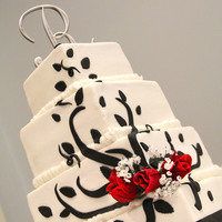 Black And White Cake This was inspired by Aldoska's cake picture. Buttercream with fondant accents. This was also a fixer upper at the venue , my dear...