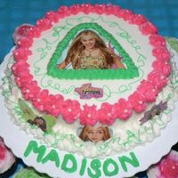 Hannah Montana Birthday Cake For Madison Hannah Montana Birthday Cake for my grand-daughter. White Wedding Cake with b/c icing. Darn Good Chocolate Cake Cupcakes. TFL!