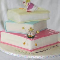 Nursery Books..baby Shower Cake gum paste mother goose and humpy dumpy sitting on MMF covered cakes