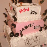 50's Theme Grad Cake chocolate/chocolate frosting + white with chocolate fill/BC frosting with gum paste trim . customer wanted a 50's theme