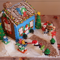 Gingerbread House Made For A Charity Event The Theme Of The Event Was Snowman Family Gingerbread house made for a charity event. The theme of the event was snowman family.