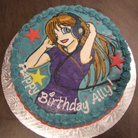Girl Listening To Music A 9" round cake with a FBT of a girl listening to music. Cake was covered with blue butter cream icing and then fondant stars and red...