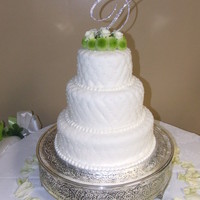 Ashley & Tim's Cake 3 tiered cake (all cakes were 4", bottom 12" & top 6" were banana chocolate chip with chocolate buttercream icing...