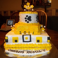 Graduation Cake made out of buttercream frosting with fondant accents. Bottom layer was square shaped, middle was a star with yellow star fondant accents,...